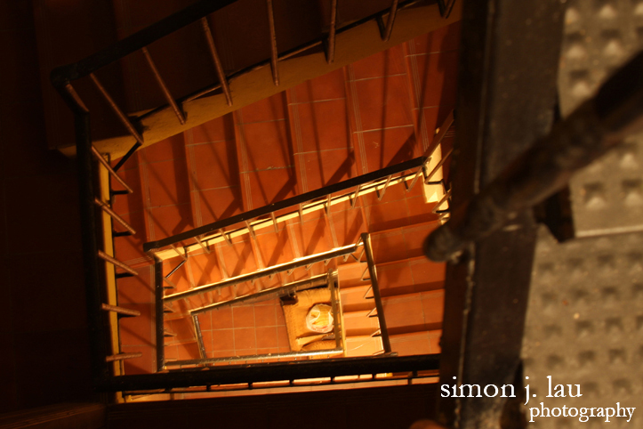 a long exposure photograph of the spiral staircase at funky hostel in granada, spain